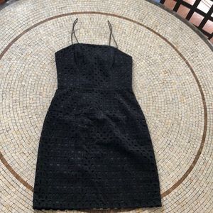 Black eyelet cocktail dress perfect for Summer events.